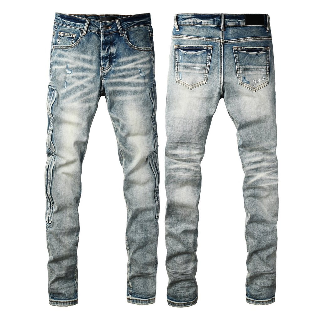 Amiri Ripped Denim Jeans
